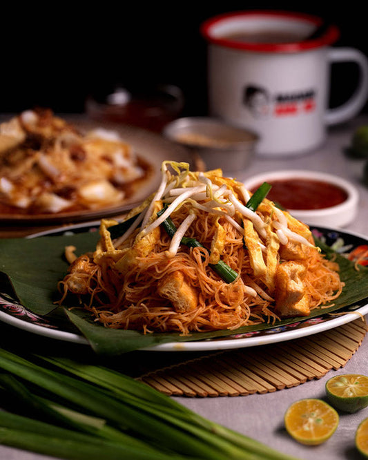 Sit down and enjoy the local flavour of Madam Ang KK